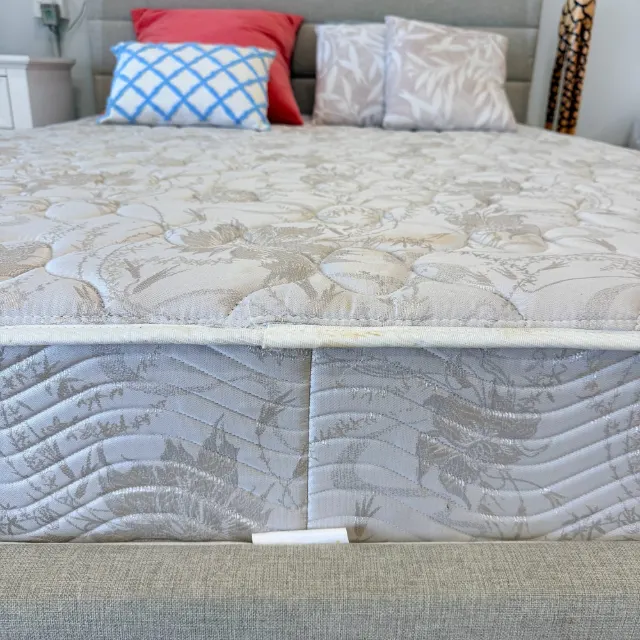 Foot end panel of the queen mattress in quilted floral damask