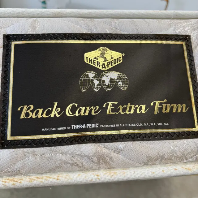 Ther-a-Pedic Back Care Extra Firm brand label on the side of the mattress
