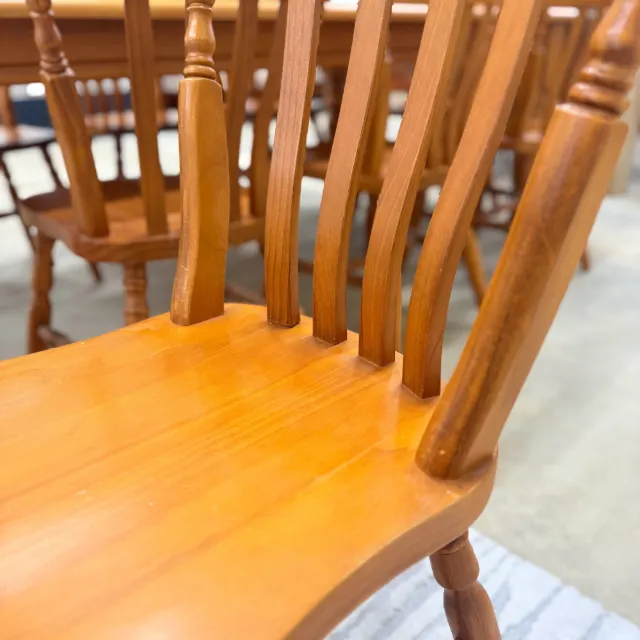 Chair back slats and shaped timber seat close-up