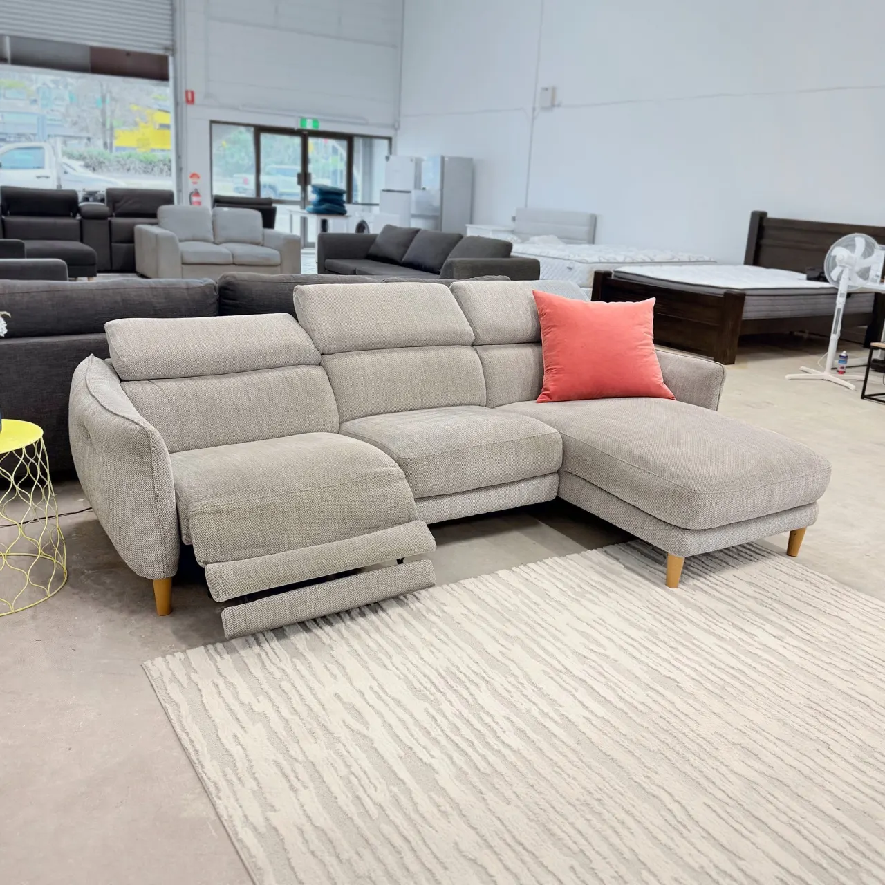 Freedom L shape sofa with the electric recliner footrest raised
