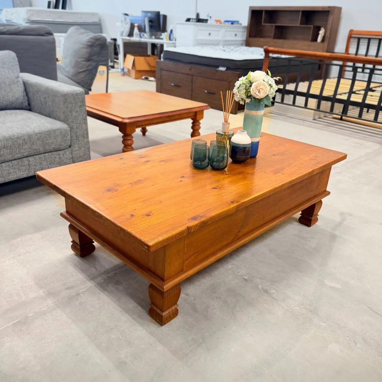 Rustic pine coffee table from the other corner, honey pine top and moulded base
