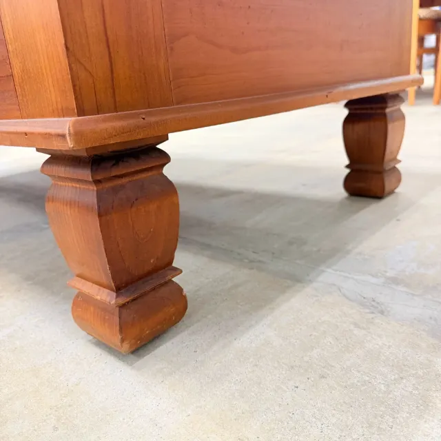 Close-up of the shaped solid pine leg