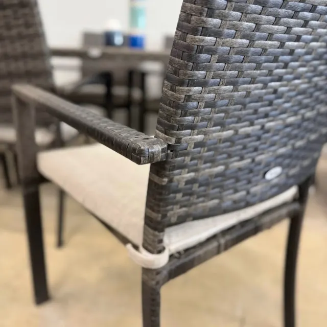 Wicker armchair arm and backrest close-up