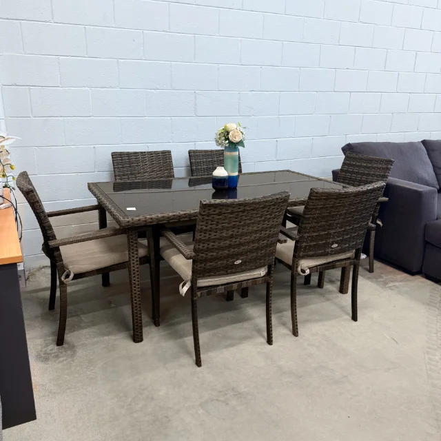 Riva 7-piece outdoor wicker dining set from the left, black glass-top table with 6 armchairs