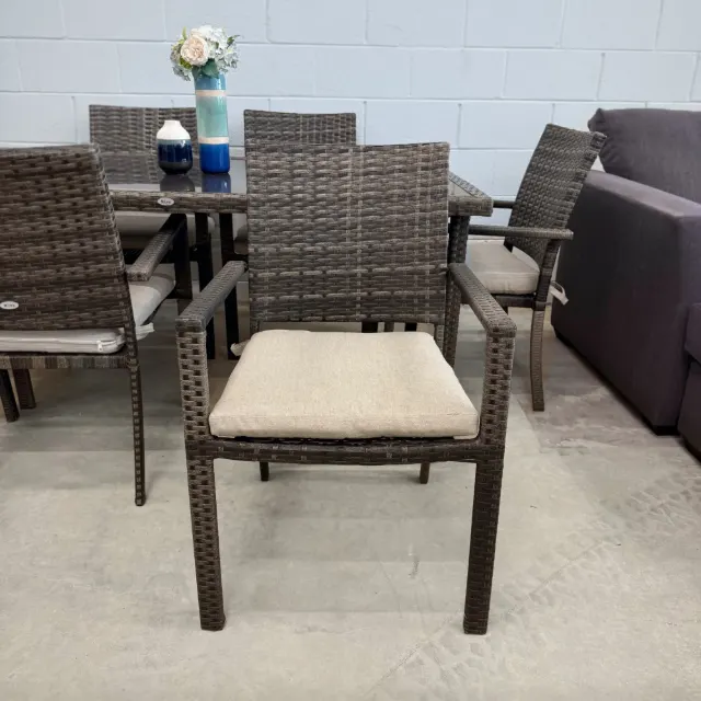 Riva wicker armchair with beige seat cushion, front view