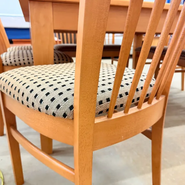 Close-up of chair back slats and padded seat
