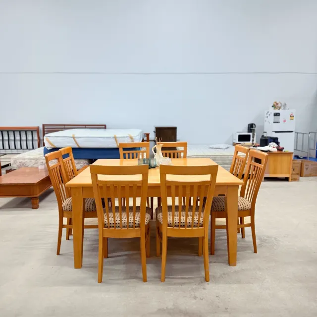 Square 9-piece timber dining set, front view with all 8 chairs