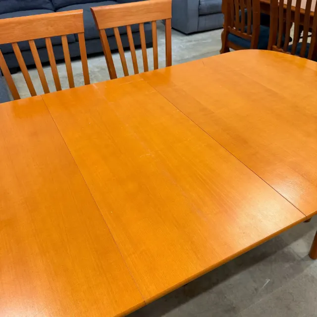 Close-up of the honey-toned timber table top