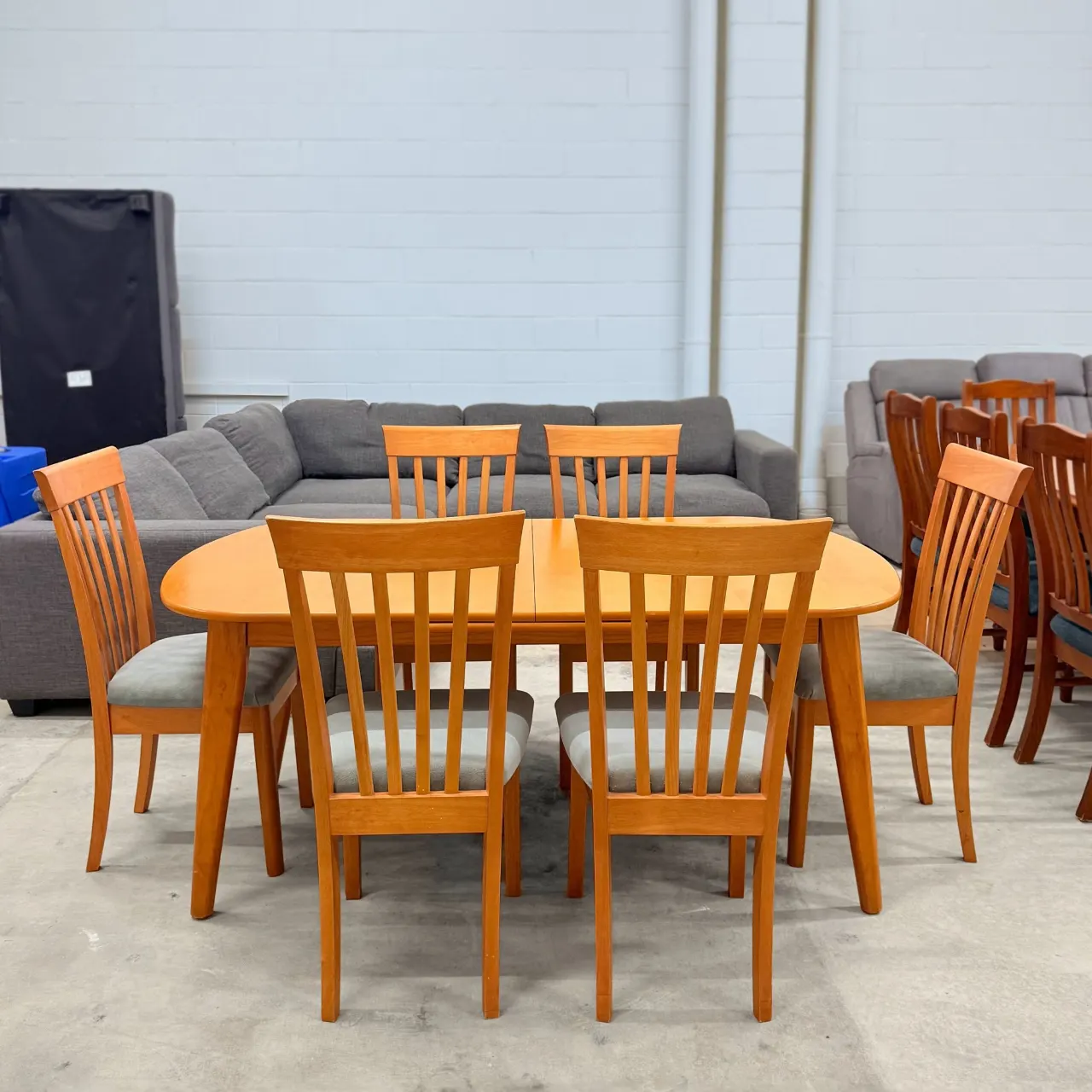 Timber 7-piece dining set: extendable table with six high-back chairs, front view