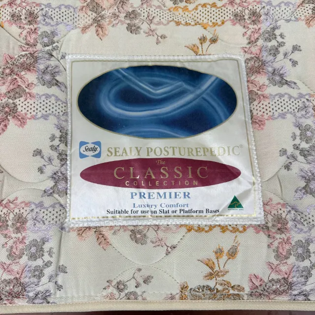 Sealy Posturepedic Classic Premier label on the mattress