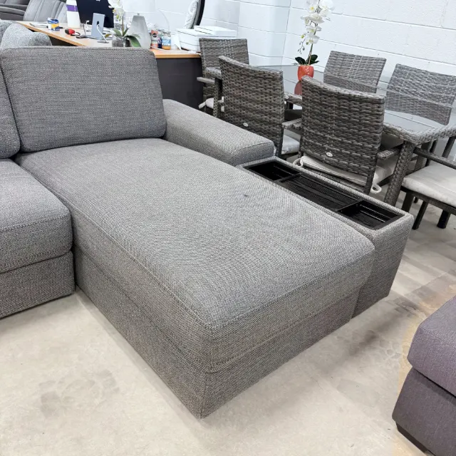 Chaise with the storage arm beside it