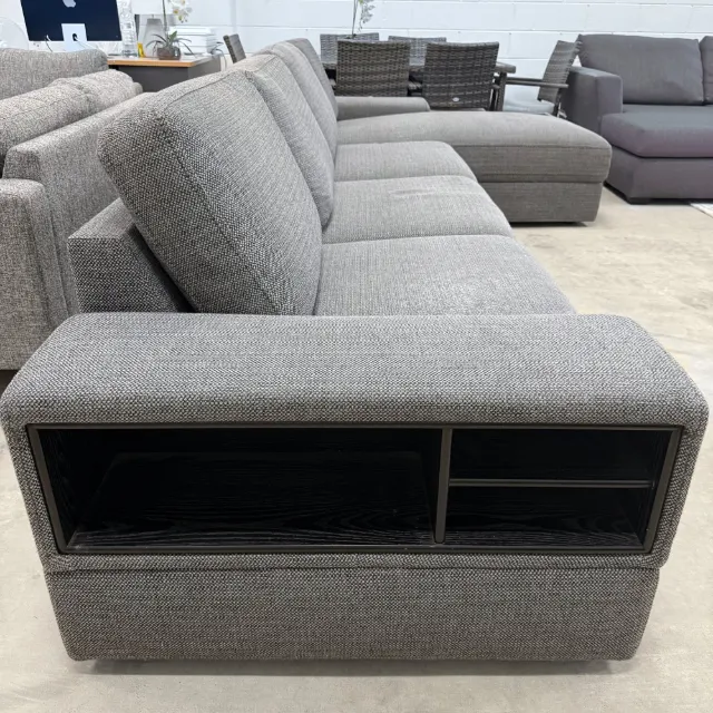End arm with a built-in open shelf