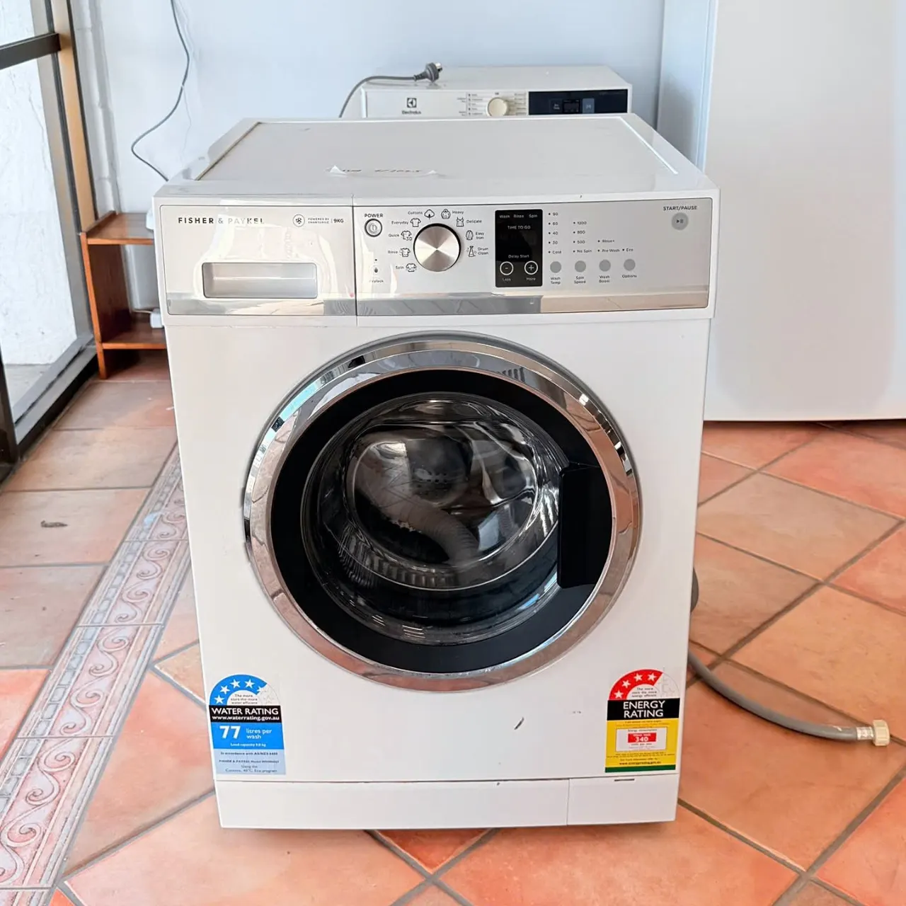 Fisher & Paykel 9kg front loader washing machine, front view