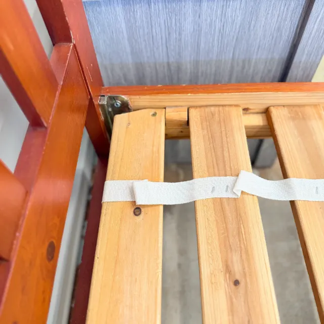 Pine slats and spacer strap on the single bed frame