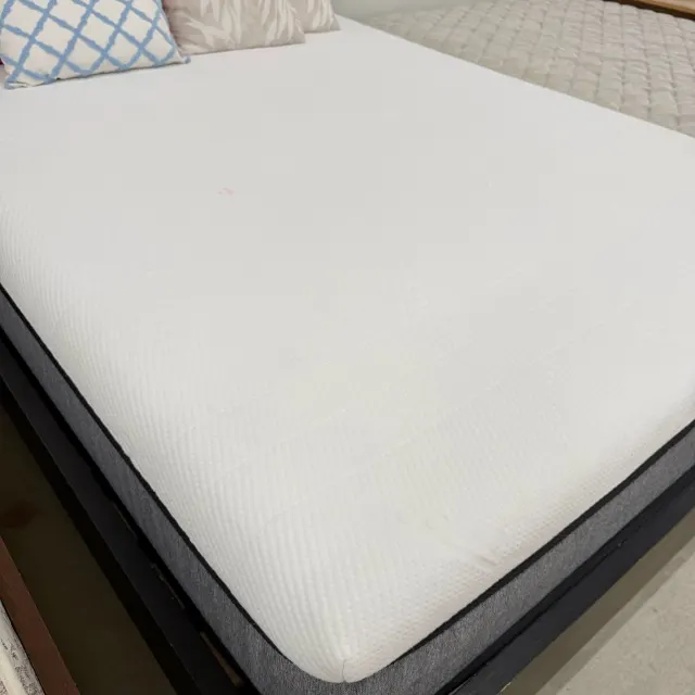 Ecosa queen mattress top with a soft quilted knit cover