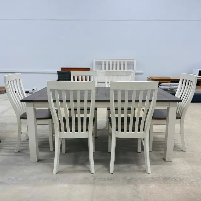 White 7-piece dining set with dark timber-look table top, front view