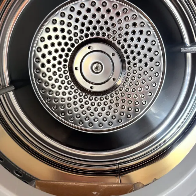 Stainless steel drum inside the Westinghouse dryer